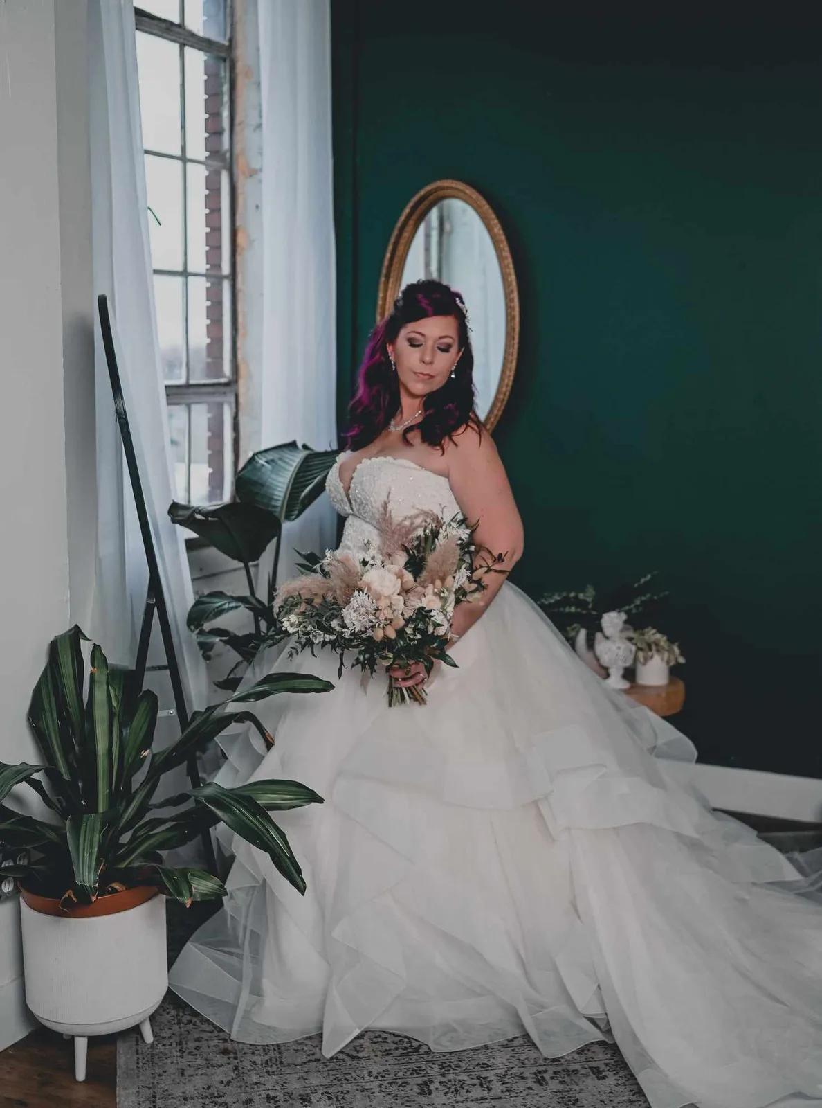 A bride beside a mirror at The Flawless Bride